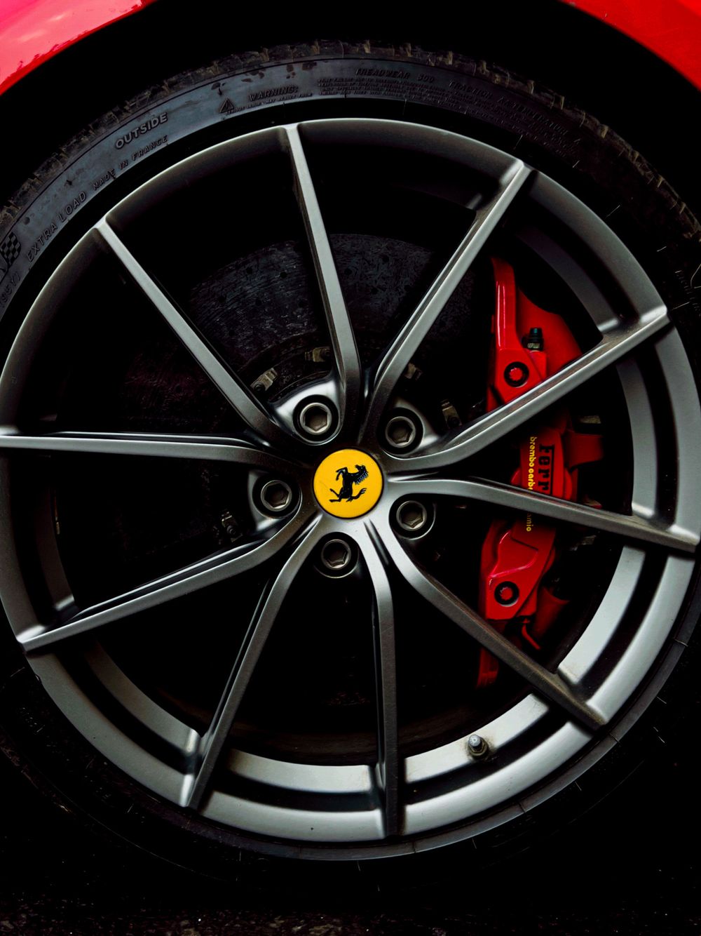 Alloy wheel with red brake caliper