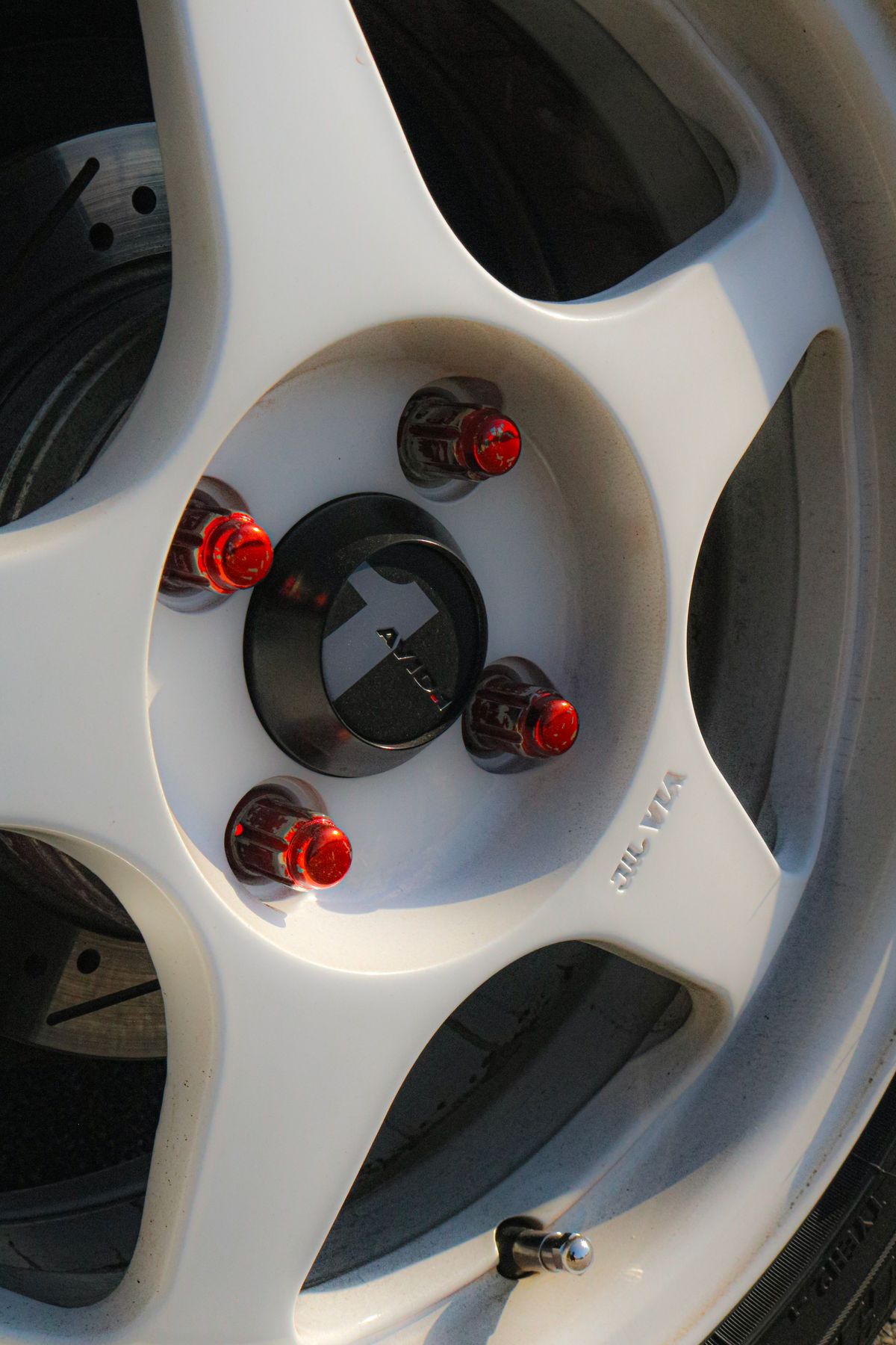 Wheel hub with new lug nuts and studs